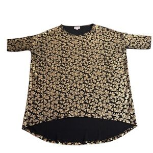 LuLaRoe Elegant Irma Top Size XXS.   Gold and black geometric print